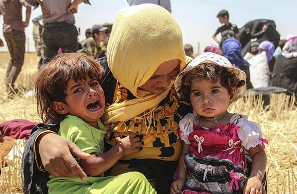 تصاویر : فرار هزاران سوری به خاک ترکیه