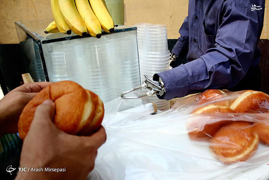 عکس: آبمیوه فروشی با دستان آهنی